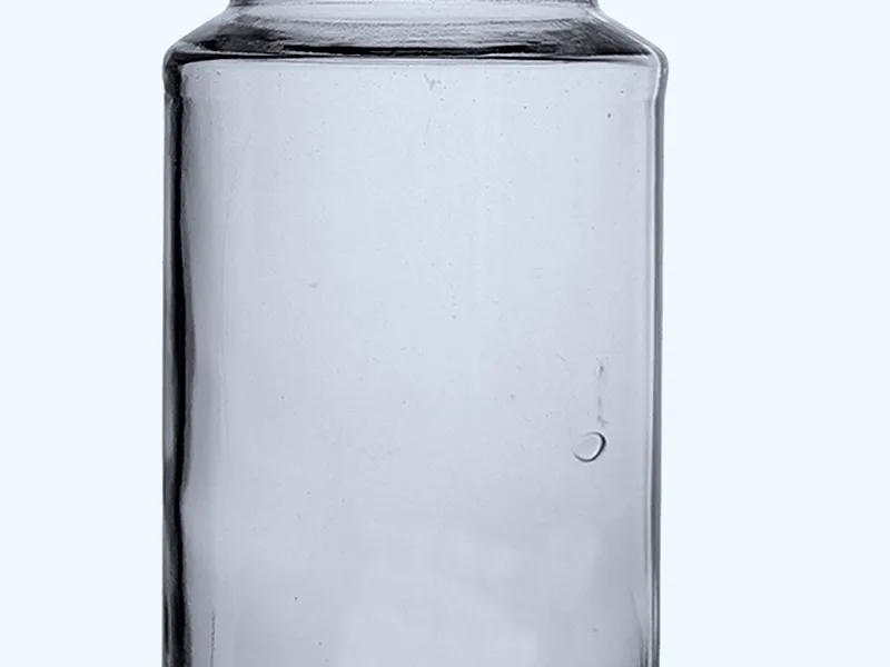 Glasbehälter mit einer Luftblase in der Wand