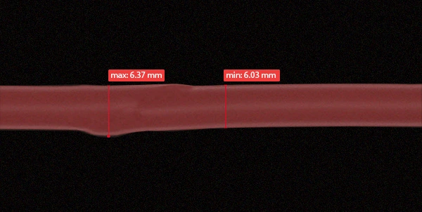 Real-time diameter monitoring and lump detection for wires and cables during extrusion.