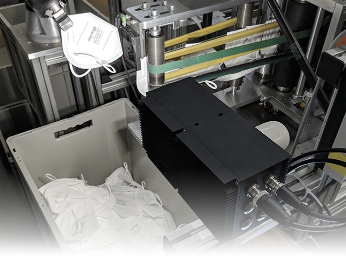 High-precision AI quality control of FFP2 masks during production.